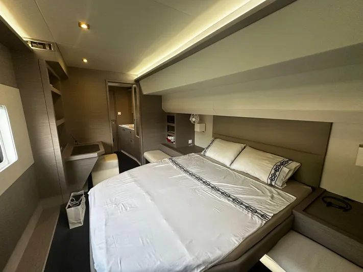  Yacht Photos Pics Luxurious bedroom interior of 2022 Fountaine Pajot MY5 yacht with modern design.