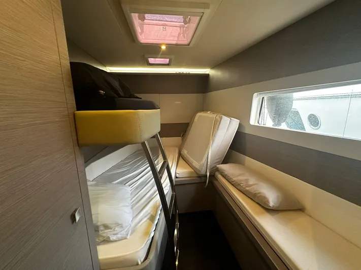  Yacht Photos Pics 2022 Fountaine Pajot MY5 cabin with bunk beds and modern interior design.