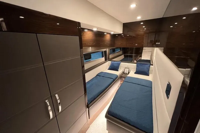  Yacht Photos Pics Luxurious interior of 2025 Cobrey 52 FLY yacht with twin beds and modern design.