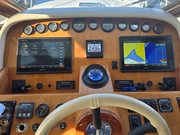 Third Wish Yacht Photos Pics 2005 Navigator 44C helm with Garmin displays and controls.