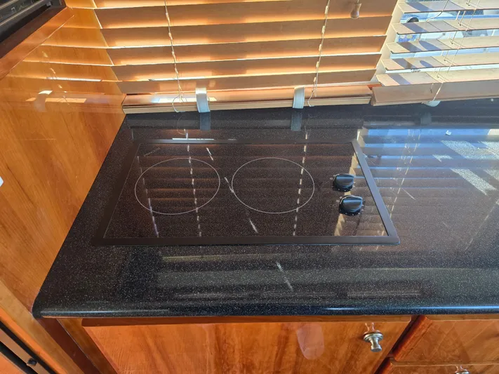 Third Wish Yacht Photos Pics Kitchen area in a 2005 Navigator 44C with stove.