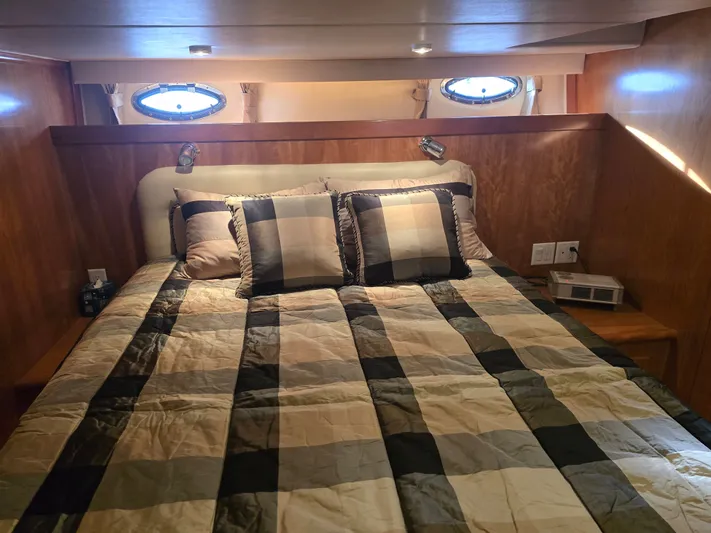 Third Wish Yacht Photos Pics Bedroom in Navigator 44C yacht, 2005 model, featuring plaid bedding.