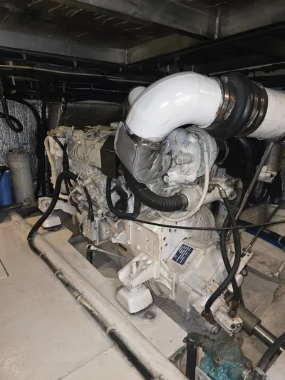 Third Wish Yacht Photos Pics Engine room of a 2005 Navigator 44C with white engine.