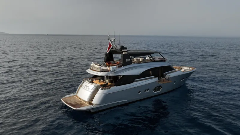Venus Yacht Photos Pics Luxurious 2013 Monte Carlo Yachts 86'7'' cruising on open sea.