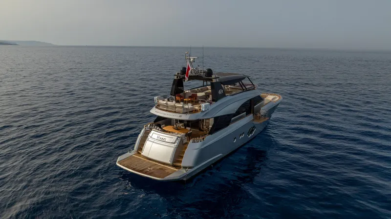 Venus Yacht Photos Pics Luxurious 2013 Monte Carlo Yachts 86'7'' cruising on open sea.