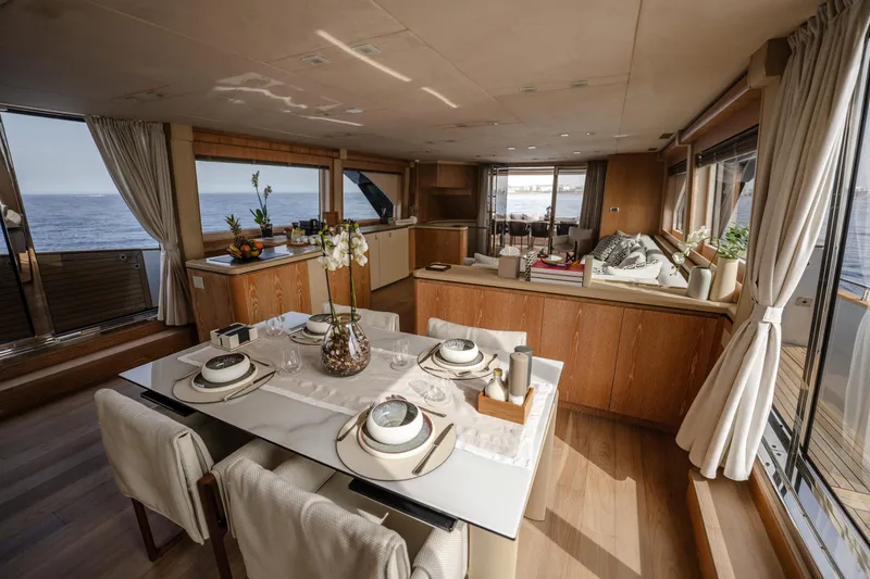 Venus Yacht Photos Pics Luxurious interior of 2013 Monte Carlo Yachts 86'7'' with elegant dining and living areas.