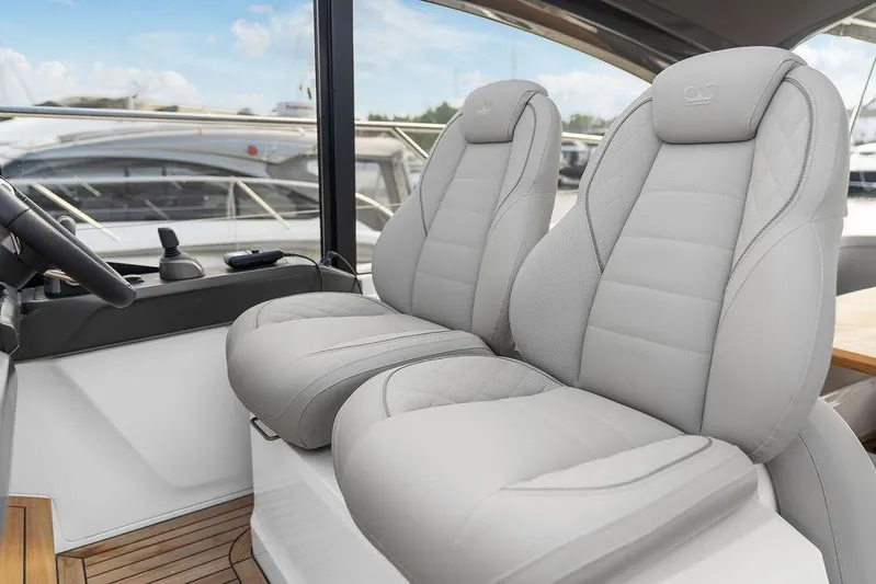 V50330 Yacht Photos Pics 2024 Princess V50 Open yacht interior with luxurious leather seats and modern design.