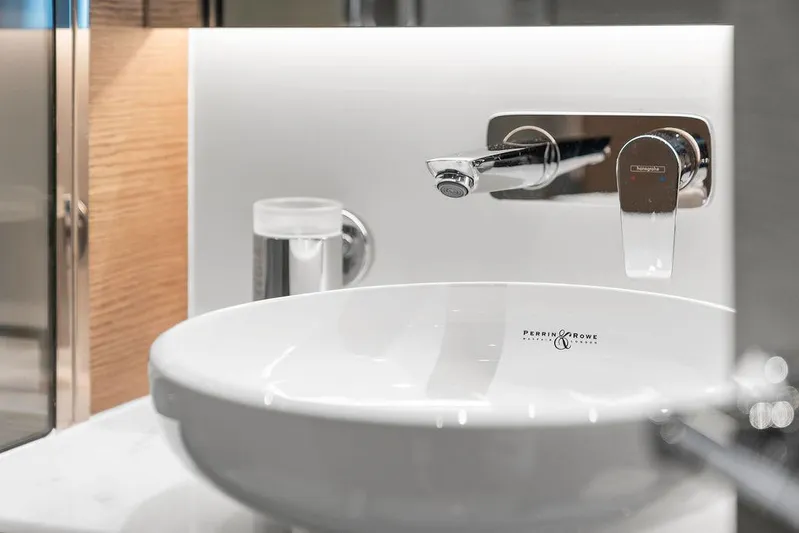 V50330 Yacht Photos Pics Modern bathroom sink with sleek faucet in 2024 Princess V50 Open yacht.