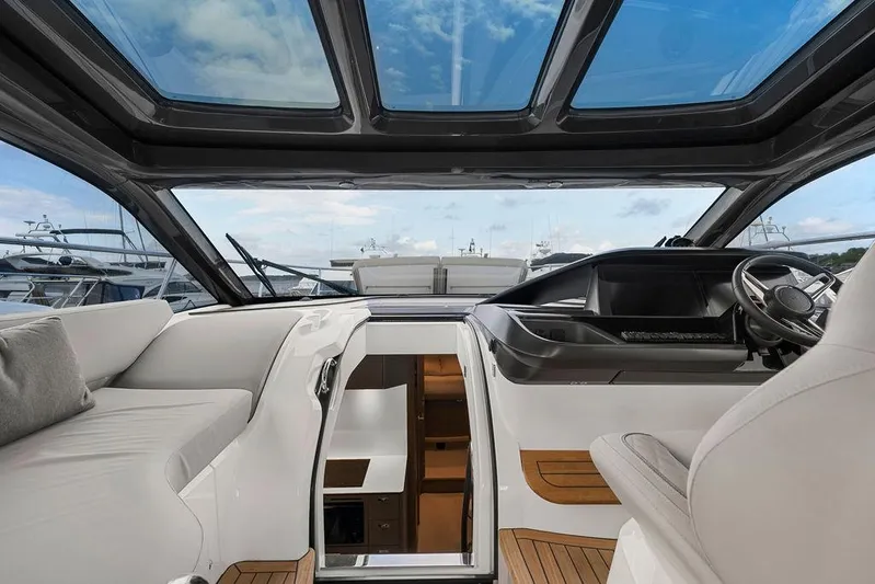 V50330 Yacht Photos Pics 2024 Princess V50 Open yacht interior with panoramic sunroof and luxurious seating.