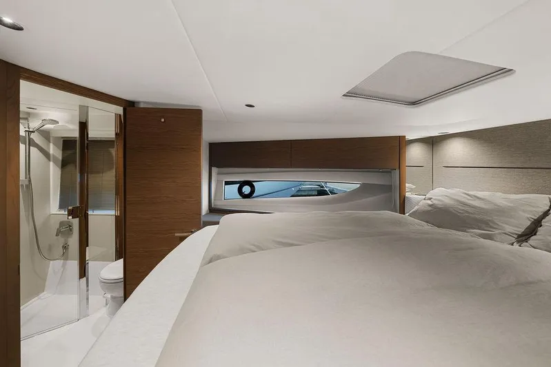 V50330 Yacht Photos Pics Luxurious interior of 2024 Princess V50 Open yacht with modern bedroom and ensuite bathroom.