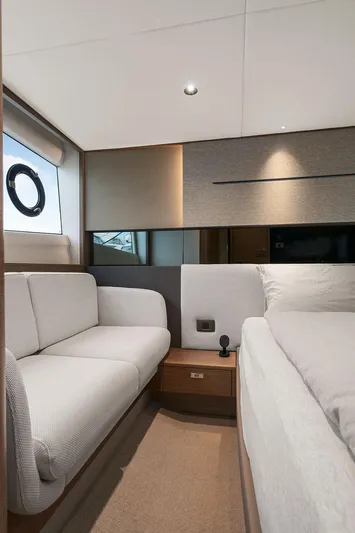 V50330 Yacht Photos Pics Luxurious interior of 2024 Princess V50 Open yacht with modern sofa and bed.