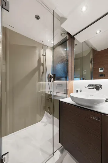 V50330 Yacht Photos Pics Luxurious bathroom in 2024 Princess V50 Open yacht, featuring modern fixtures and elegant design.