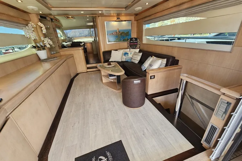 Tivella Yacht Photos Pics Luxurious interior of 2009 VZ 68 FLY yacht with modern decor and comfortable seating.
