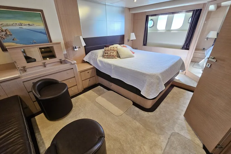 Tivella Yacht Photos Pics Luxurious bedroom interior of 2009 VZ 68 FLY yacht with modern furnishings and decor.