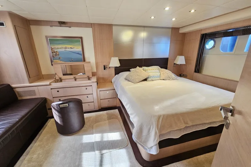 Tivella Yacht Photos Pics Luxurious bedroom interior of 2009 VZ 68 FLY yacht with modern furnishings and decor.