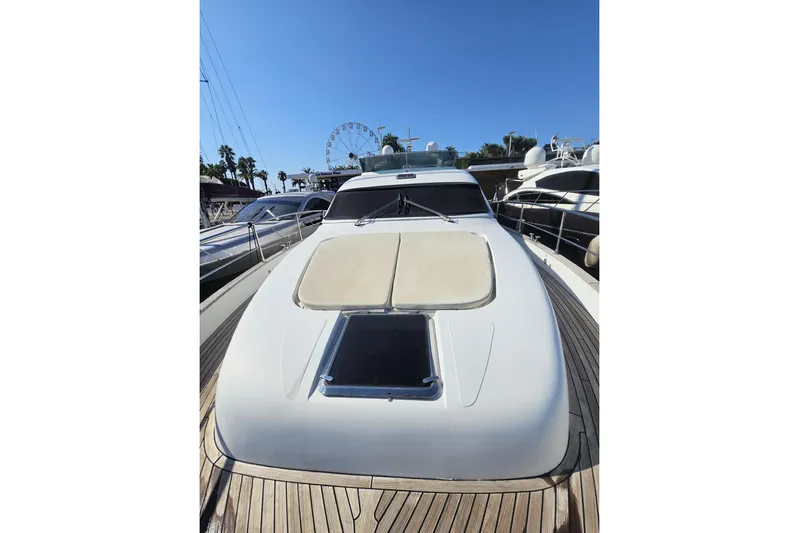 Tivella Yacht Photos Pics Luxury VZ 68 FLY yacht, 2009 model, docked under clear blue sky.