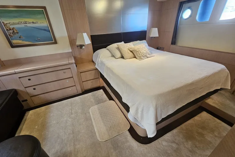 Tivella Yacht Photos Pics Luxurious bedroom interior of 2009 VZ 68 FLY yacht with elegant decor and cozy bedding.