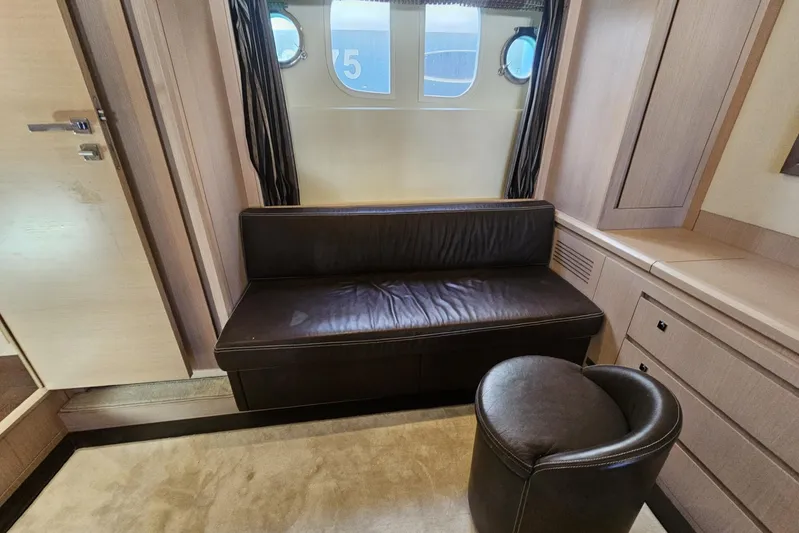 Tivella Yacht Photos Pics Luxurious interior of 2009 VZ 68 FLY yacht with leather seating and porthole view.