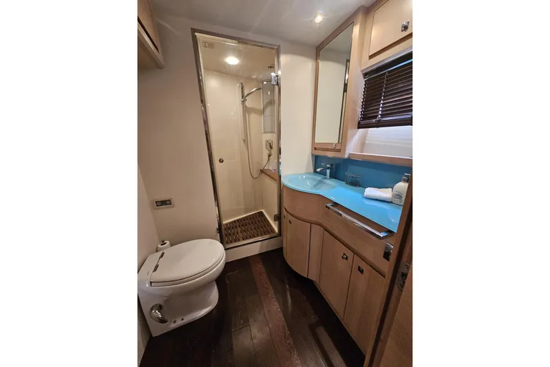 Tivella Yacht Photos Pics Luxurious bathroom in 2009 VZ 68 FLY yacht with modern fixtures and elegant design.