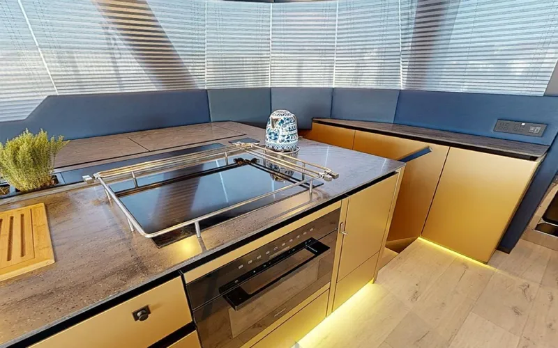 Catallaxi Yacht Photos Pics Modern kitchen interior on 2024 Sunreef 60 Sail yacht with sleek countertops and appliances.