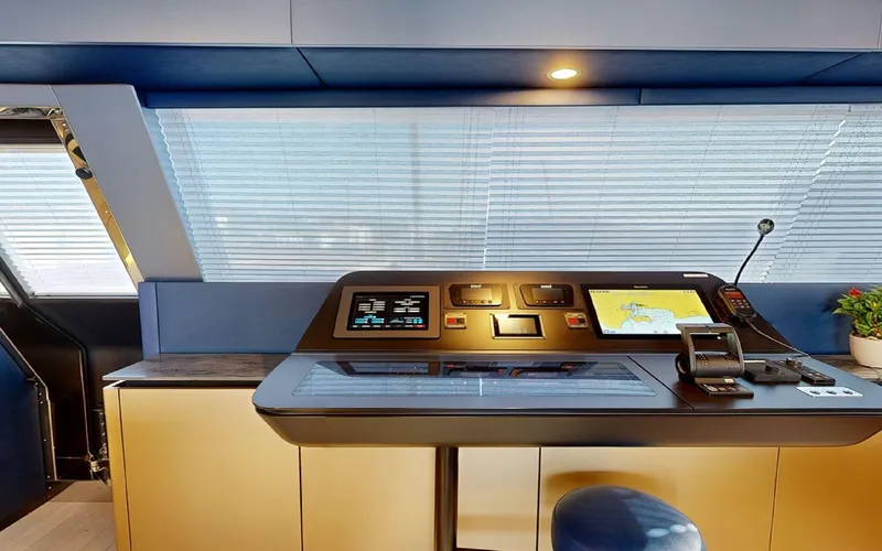 Catallaxi Yacht Photos Pics Modern helm station of 2024 Sunreef 60 Sail yacht with navigation equipment.