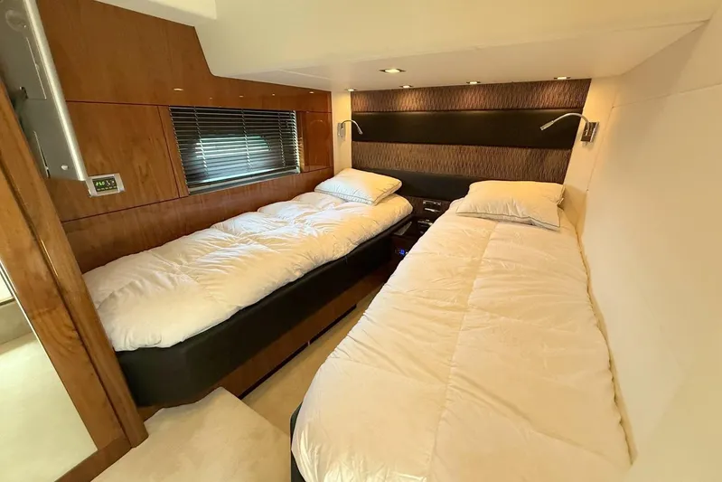 M/y Titan Yacht Photos Pics Luxurious twin cabin interior on 2011 Sunseeker Predator 74 yacht.