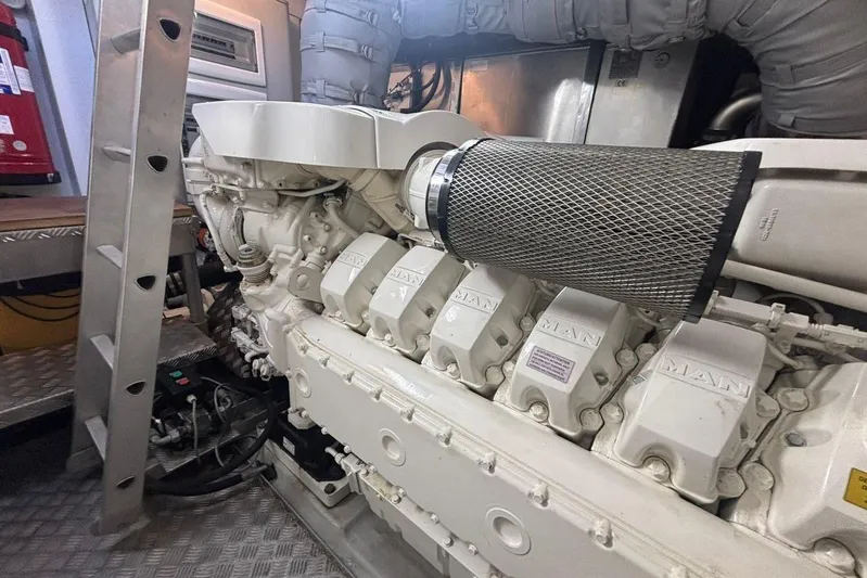 M/y Titan Yacht Photos Pics Engine room of 2011 Sunseeker Predator 74 yacht, featuring a powerful MAN engine.