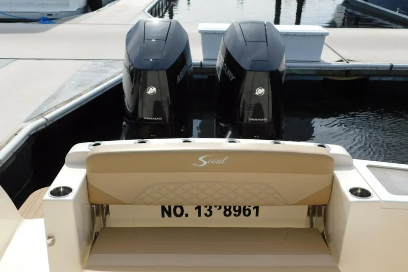  Yacht Photos Pics 2024 Scout 330 LXF boat with dual Mercury Verado engines at dock.