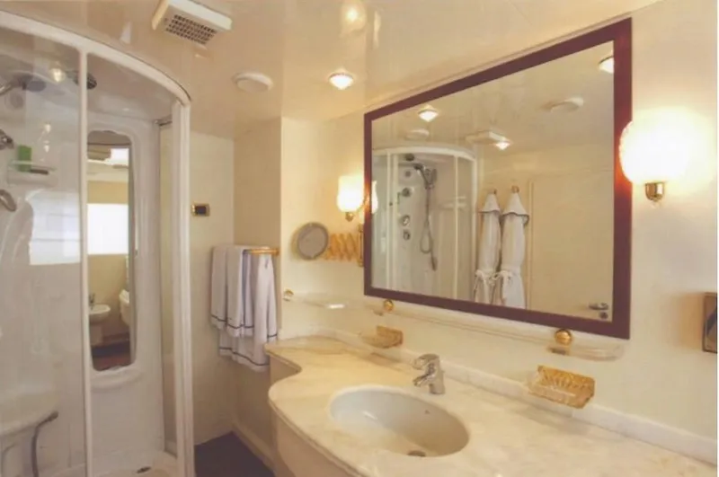  Yacht Photos Pics Luxurious bathroom on Castagnola 30 mt yacht, 2001 model, featuring elegant fixtures and spacious shower.