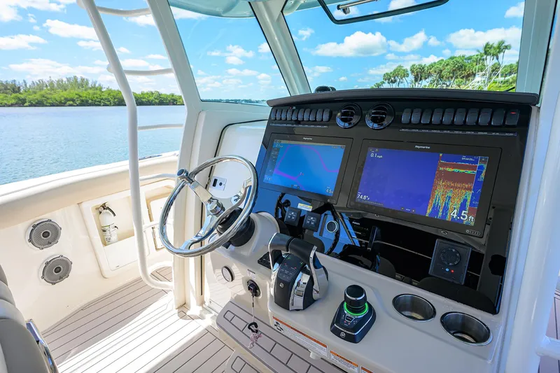Who's Sippin Yacht Photos Pics Helm of 2021 Boston Whaler 380 Outrage with advanced navigation displays.