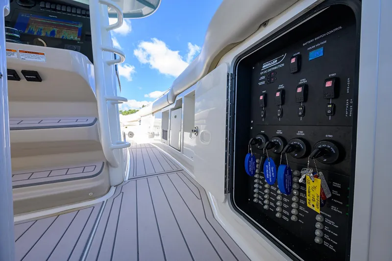 Who's Sippin Yacht Photos Pics 2021 Boston Whaler 380 Outrage control panel and deck, showcasing modern design and functionality.