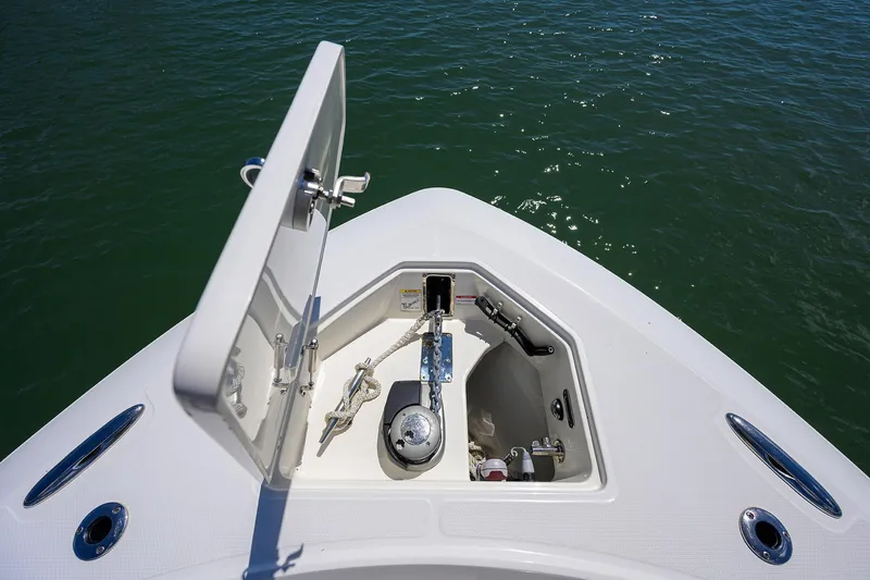 Who's Sippin Yacht Photos Pics 2021 Boston Whaler 380 Outrage anchor compartment on calm water.