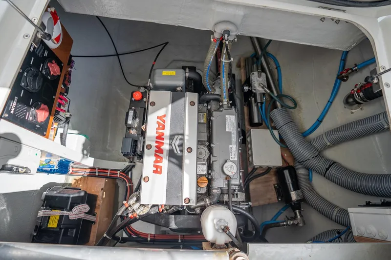 Tide Together Yacht Photos Pics Engine room of 2023 Lagoon 42 catamaran with Yanmar engine and electrical components.