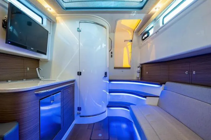 Aj Yacht Photos Pics Luxurious interior of 2020 Boston Whaler 420 Outrage with modern amenities and ambient lighting.