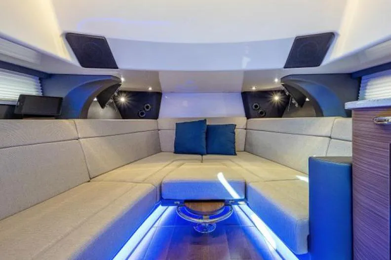 Aj Yacht Photos Pics Luxurious interior of 2020 Boston Whaler 420 Outrage with plush seating and ambient lighting.