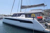 2022 Leopard 50 catamaran docked in marina, featuring sleek design and modern amenities.