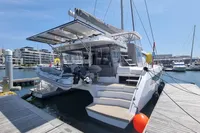 Luxury Leopard 50 catamaran docked at marina, 2022 model, sunny day.