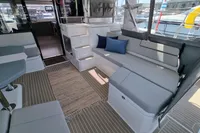 Luxurious interior of 2022 Leopard 50 yacht with modern seating and nautical decor.