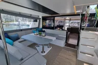 Luxurious interior of 2022 Leopard 50 yacht with spacious seating and modern design.