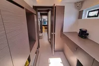 Modern interior of a 2022 Leopard 50 yacht with sleek wood finishes.