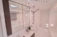 Modern bathroom interior in 2022 Leopard 50 yacht, featuring sleek design and elegant fixtures.