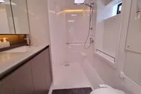 Modern bathroom in a 2022 Leopard 50 yacht, featuring sleek design and elegant fixtures.