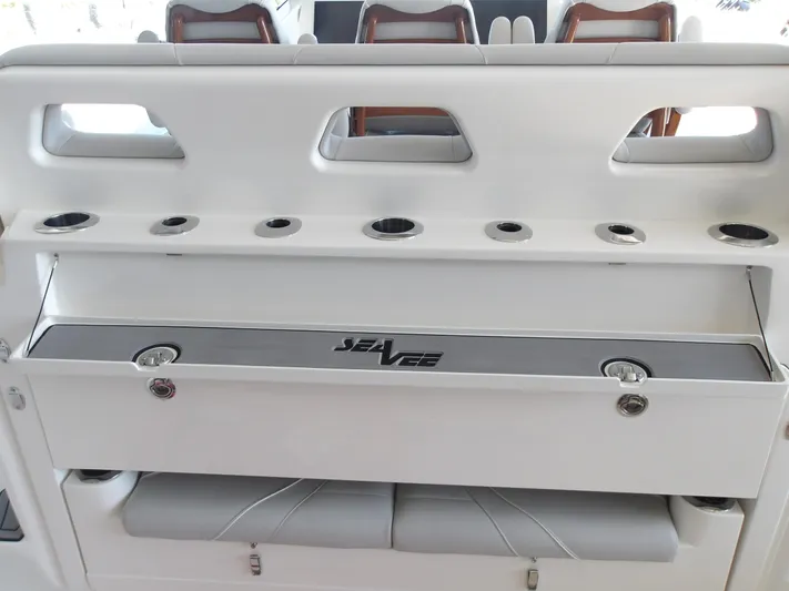 Yacht Photos Pics 2025 SeaVee 420Z boat interior with rod holders and storage compartments.