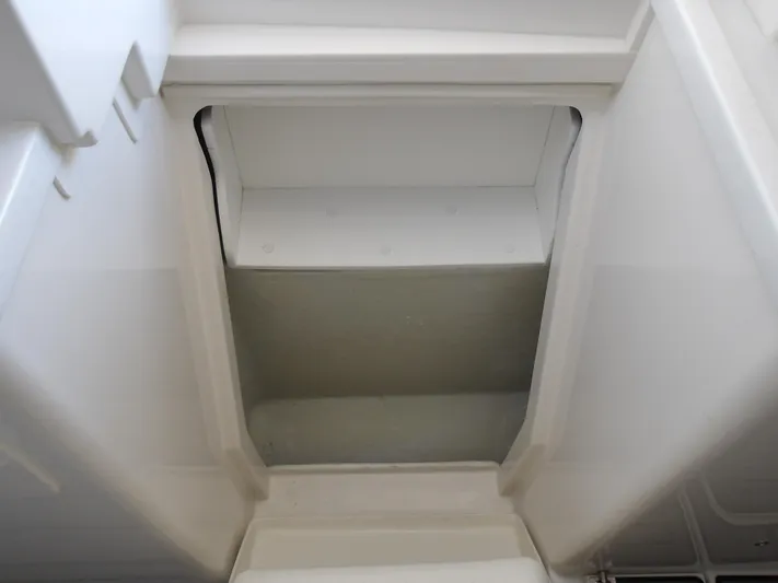  Yacht Photos Pics Storage compartment of 2025 SeaVee 420Z boat, featuring a spacious interior design.