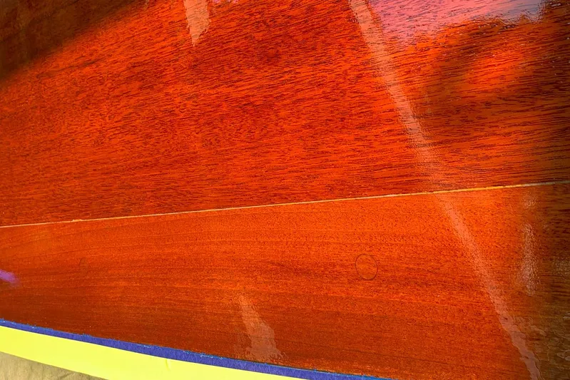 Miss Phebe II Yacht Photos Pics Polished wooden surface of a 1971 Whiticar 62 Convertible boat.