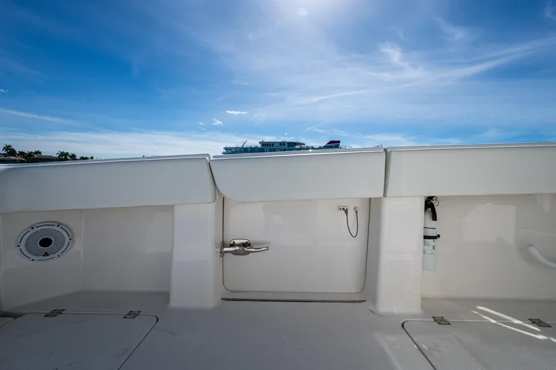 Hoosier Hooker Yacht Photos Pics 2021 Invincible 40 Catamaran deck with clear sky and safety equipment.