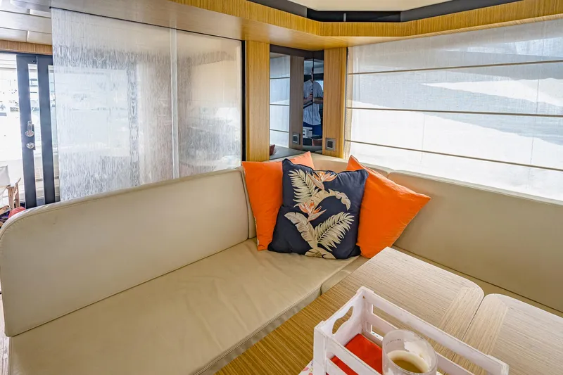 Tara Yacht Photos Pics Luxurious interior of 2017 Absolute 50 Fly yacht with stylish cushions and modern decor.