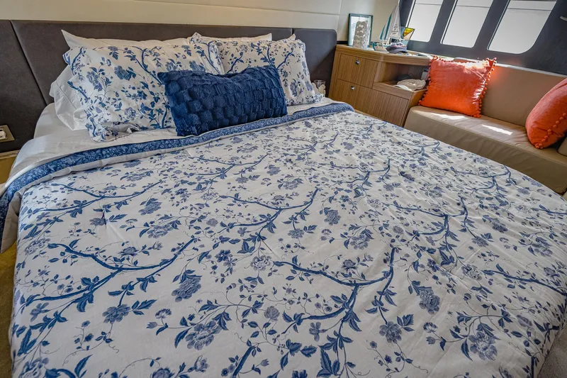 Tara Yacht Photos Pics Luxurious bedroom with floral bedding on 2017 Absolute 50 Fly yacht.