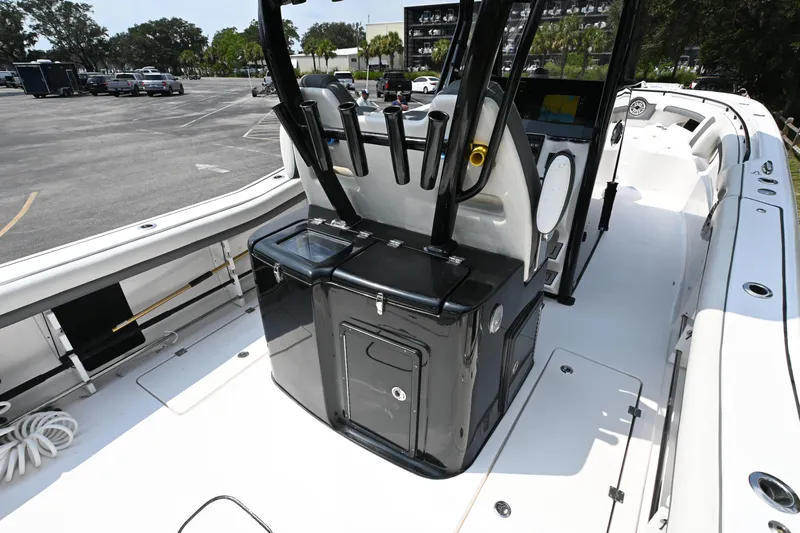 Yacht Photos Pics 2020 Tidewater 320 CC Adventure boat interior with sleek console and seating.
