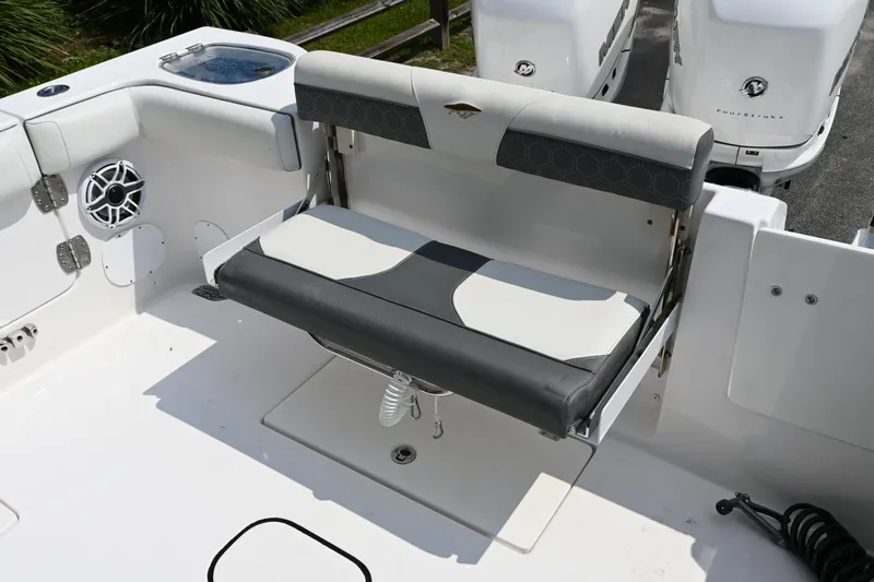 Yacht Photos Pics 2020 Tidewater 320 CC Adventure boat with foldable seating and dual outboard motors.